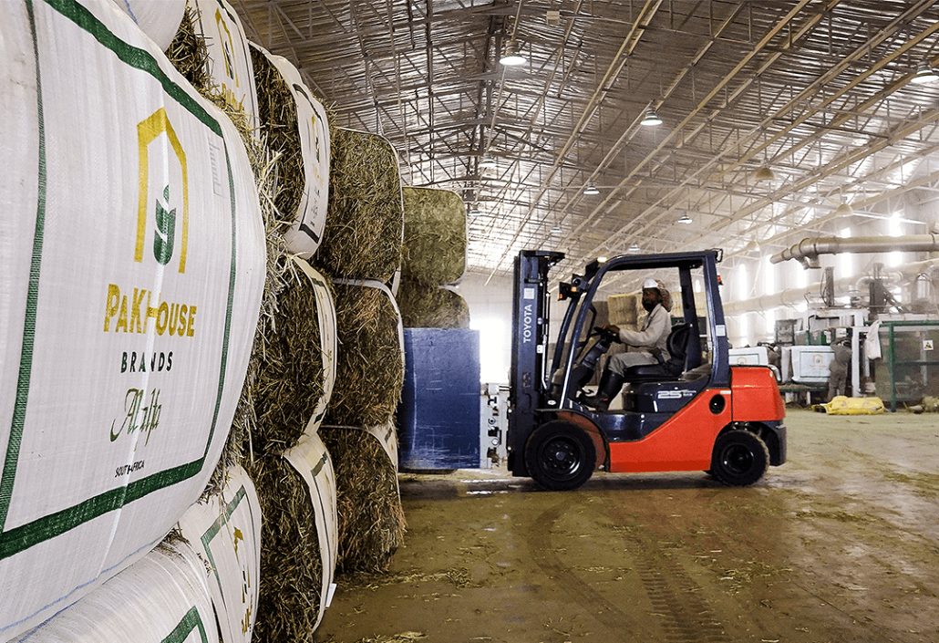 forklift and lucerne bales