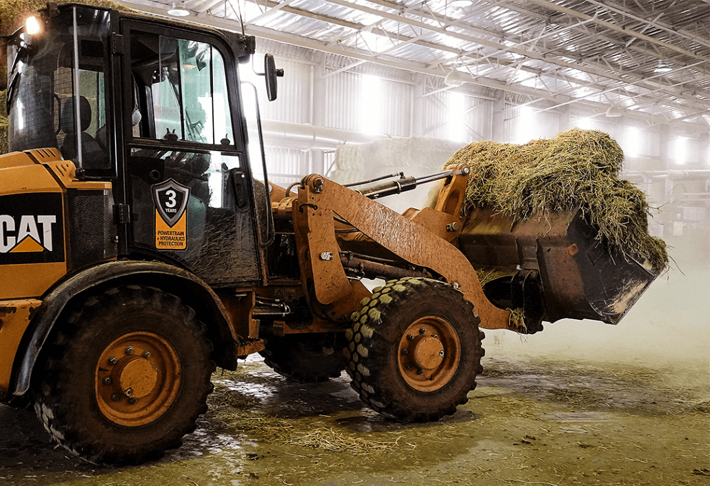 front loader carrying lucerne