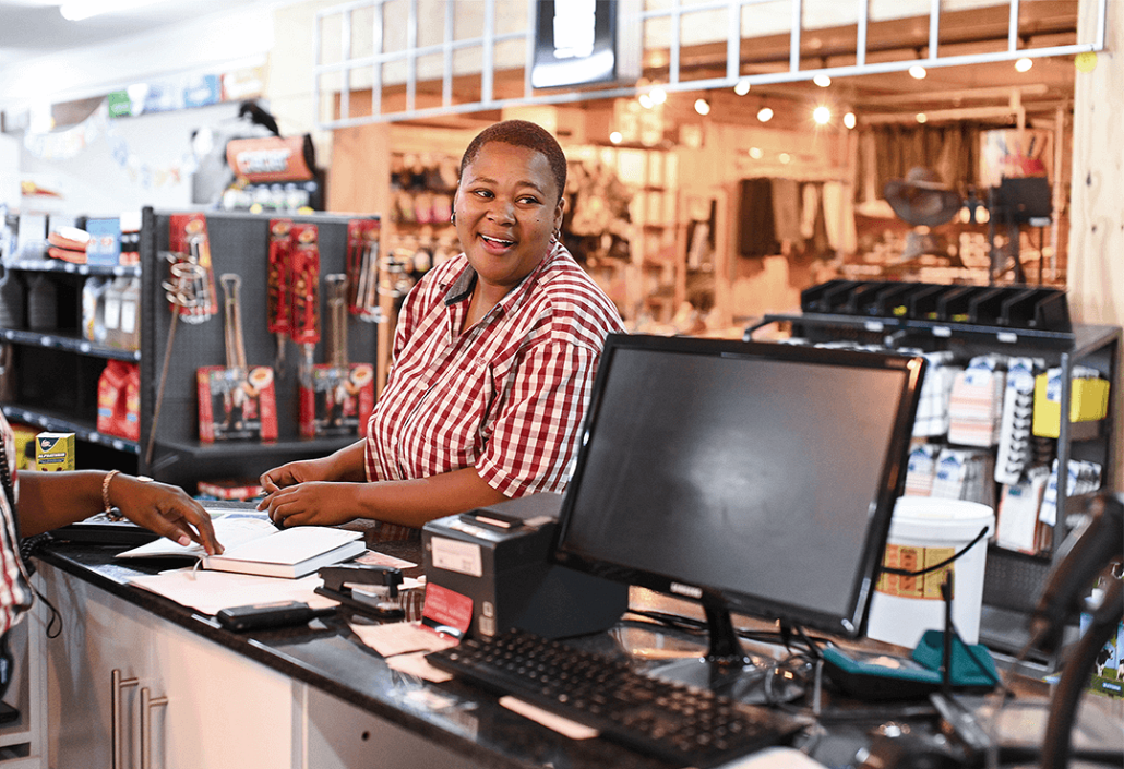 lady at counter and monitor